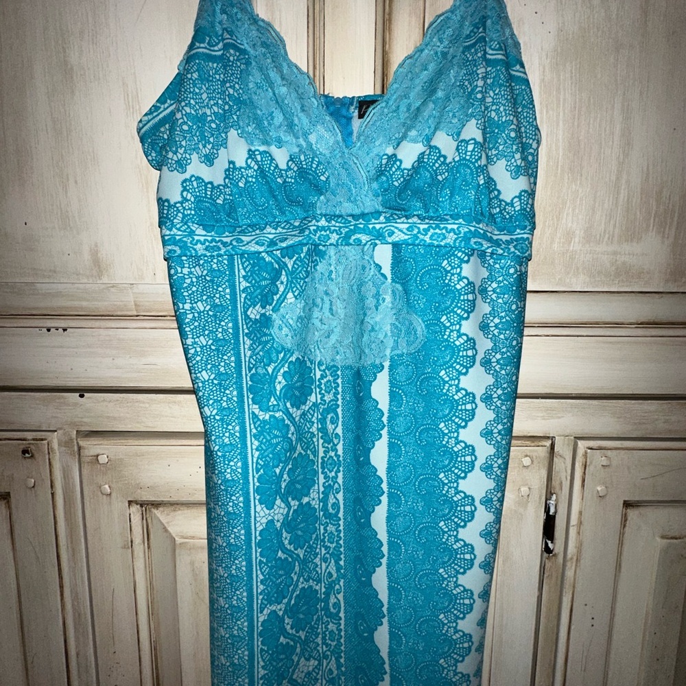 Turquoise Lace detailed spaghetti strap long blouse with zippered form fit